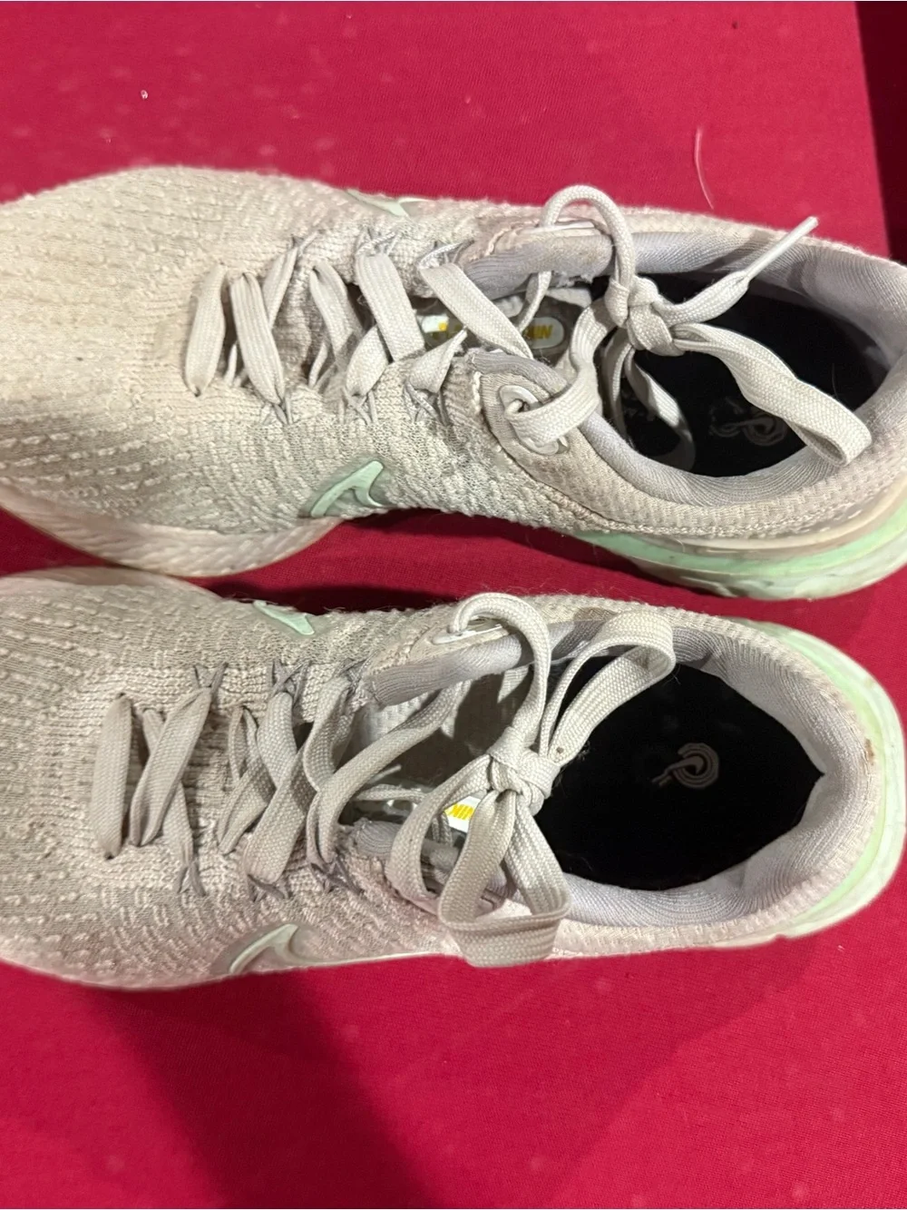 Nike Women’s Light Gray Knit Sneakers with Mint Accents